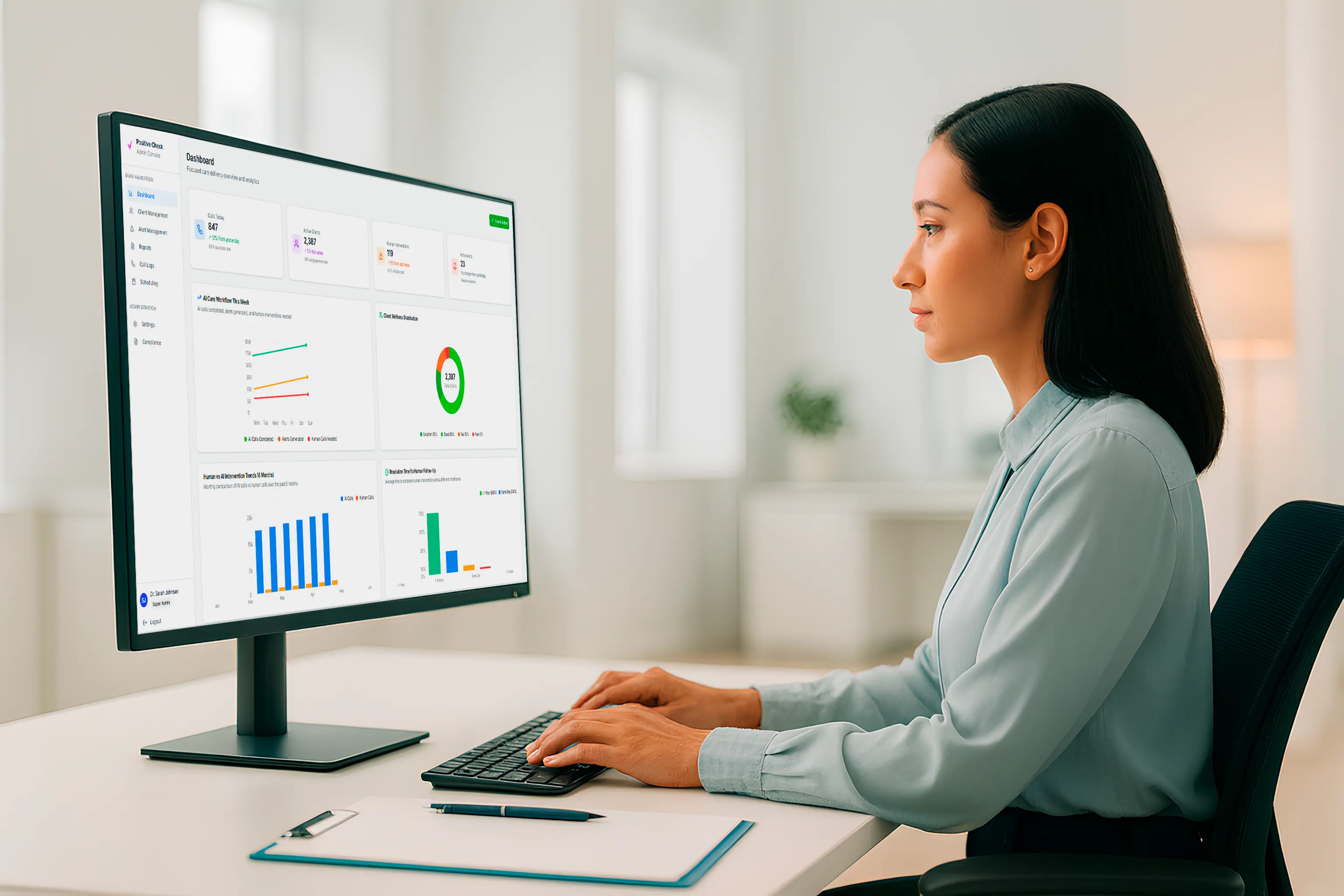 Healthcare provider using Positive Check admin dashboard to monitor patient wellness